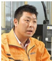 植木正春専務の肖像写真