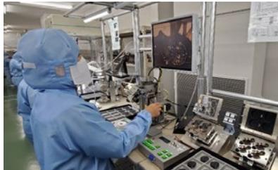 Worker assembling a product